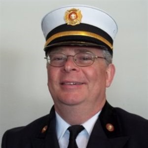 photo Rev. Jim Tilbe in uniform. courtesy of Massachusetts Conference United Church of Christ